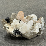 Apatite, Black Tourmaline, Muscovite, and Feldspar